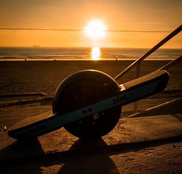 Onewheel à la Plage Sous le Soleil